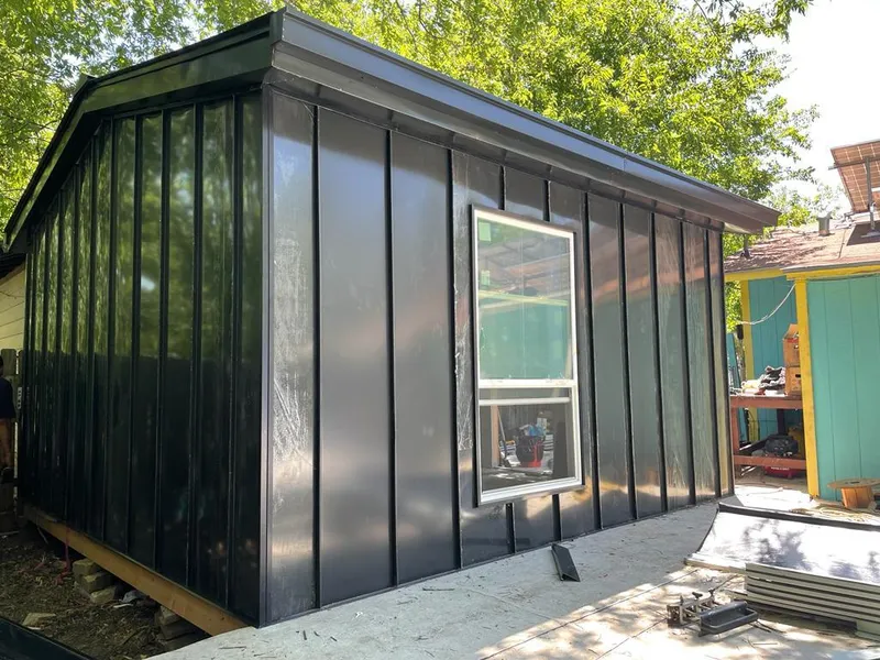 Black standing seam metal wall panels for Roof Inspection in Linden